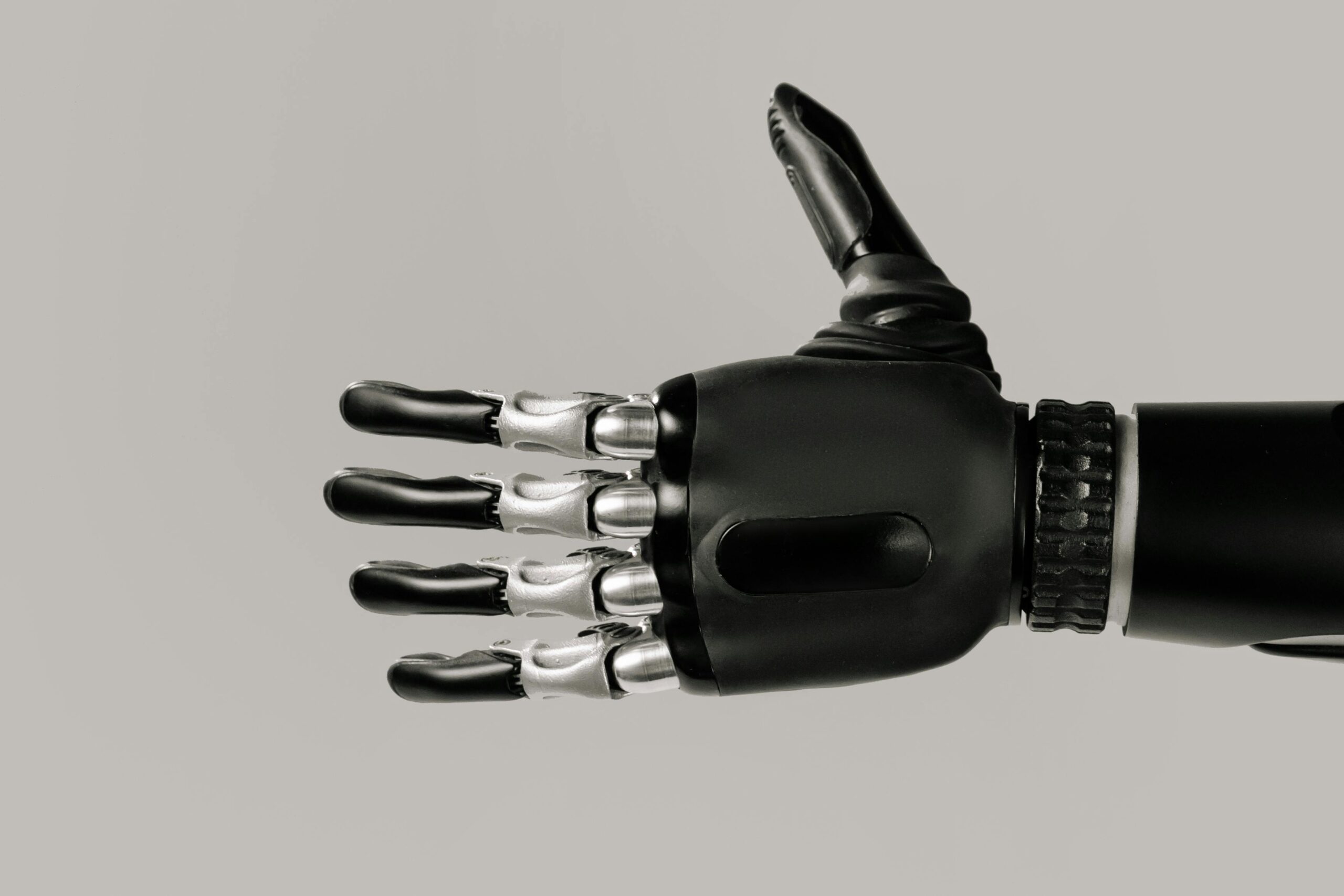 Black Robotic Hand with Thumb Up